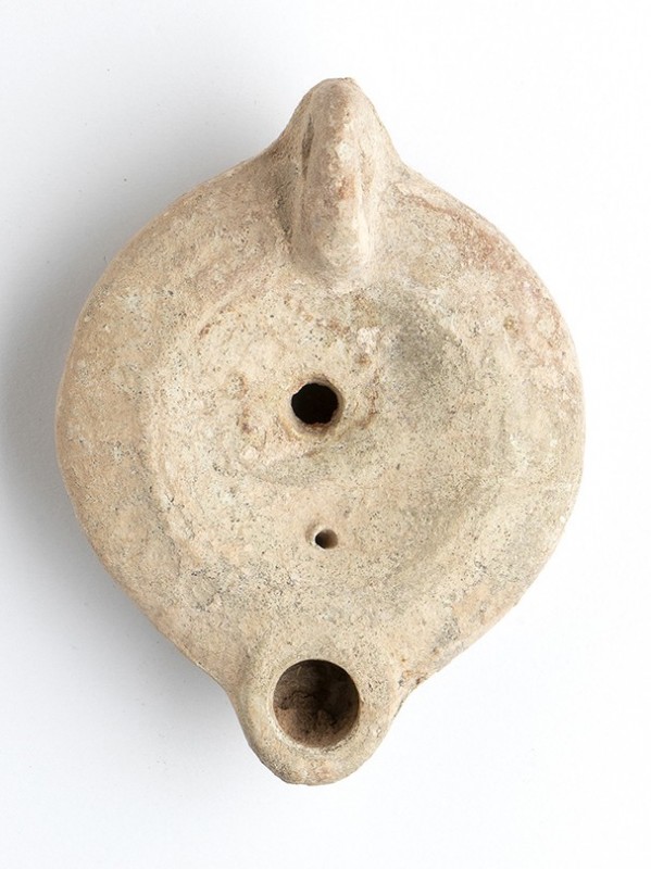 Roman Oil Lamp, 1st - 2nd century AD; height cm 4, length cm 9. Provenance: From...