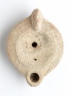 Roman Oil Lamp, 1st - 2nd century AD; height cm 4, length cm 9. Provenance: From the collection of a Diplomatic family since 1980s.