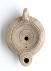 Roman Oil Lamp, 1st - 2nd century AD; height cm 4, lenght cm 10; Stamp on rear. Provenance: From the collection of a Diplomatic family since 1980s.