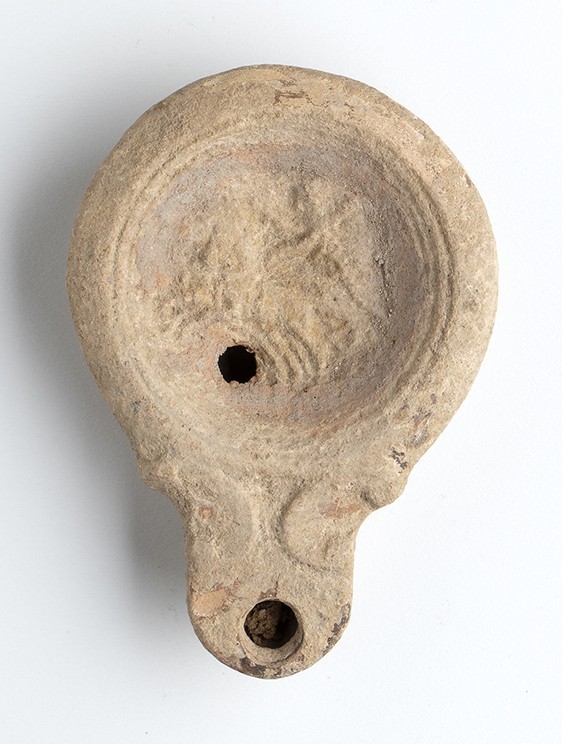 Roman Oil Lamp with Chariot, 1st - 2nd century AD; height cm 2,5, length cm 10,5...