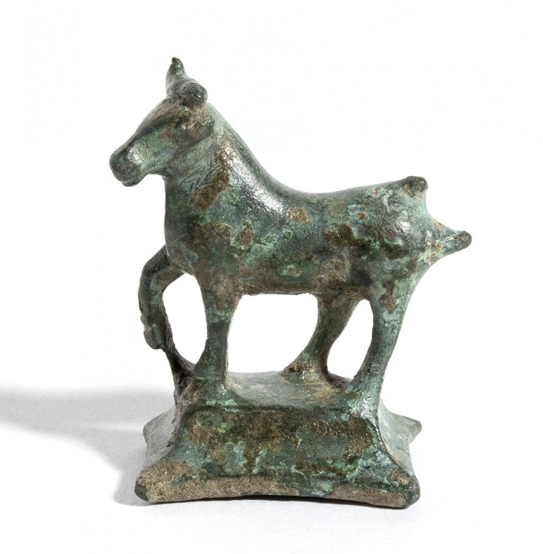 Roman Bronze Bull Statuette, 1st - 2nd century AD; height cm 4, length cm 3,4. P...