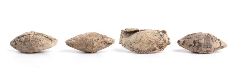 Group of Four Greco-Roman Lead Sling-Bulllets, 2nd century BC - 2nd century AD; ...