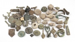 Group of Several Roman Bronze and Lead Items, from 3rd century BC; length max (fibula with needle) cm 5,3 - min (squared plaquette) cm 1. With pieces ...