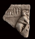 Roman Marble Relief with Circus Scene, 3rd - 4th century AD; length cm 22; Depicting a race chariots in the Roman circus, in which the charioteer is r...