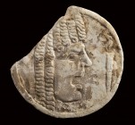 Roman Marble Oscillum with Theatrical Mask, 1st century AD; diam cm 24; height cm 27,5 (with stand); wide cm 2,4; Circular oscillum carved on both sid...
