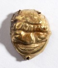 Etruscan Gold Mask, 5th - 4th century BC; height cm 2; An applique for a jewel. Provenance: Private collection, London, acquired 1960s - 1980s.