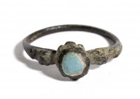 Reinassance Bronze Ring with Turquese Glass, 15th - 16th century; diam cm 1,7. Provenance: English private collection.