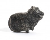 Egyptian Basalt Amulet in the Shape of a Tied Ox, New Kingdom, Dynasty XVIII-XX, 1550 - 1070 BC; length cm 3,5. Provenance: English private collection...