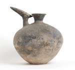 Iranian Amlash Culture Big Spouted Jar, 9th - 8th century BC; height cm 33; diam. cm 9; Resembling a graceful abstract bird, with the spout representi...