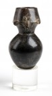 Antropomorphic Jar, Colombia, Tairona Culture, ca. AD 1000 – 1500; height cm 16; diam. cm 5,7; Covered by a bright, shiny dark brown engobe, obtained ...