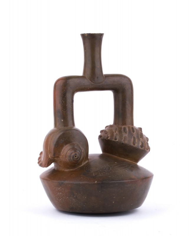 Stirrup-spouted bulbous bottle, Peru, Chavin Culture, ca. 7th century BC; height...