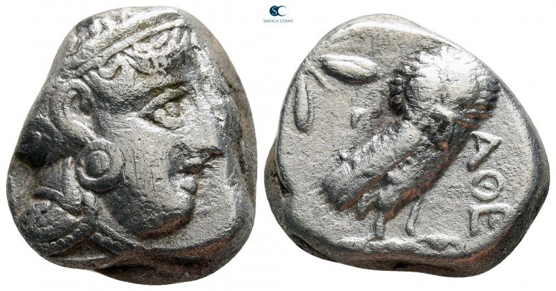 Attica. Athens circa 350-294 BC. 
Tetradrachm AR

23 mm, 16,74 g

Helmeted ...