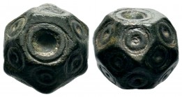 Byzantine bronze dice weight with ring and dot motifs,About fine to about very fine. Condition: Very Fine

Weight: 14,54 gr
Diameter: 12,60 mm
