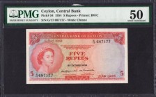 Ceylon Central Bank 5 Rupees Pick 54 dated 16th October 1954 serial number G/17 687177. A stunning Bradbury, Wilkinson & Co print in orange on aqua an...