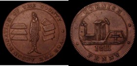 Penny 19th Century Cornwall 1811 County issue. Obverse: Pumping station, Reverse: Ingots of tin and a pilchard W.701 VF