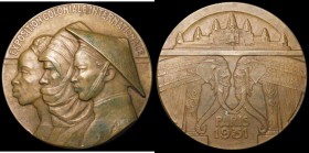 France, Exposition Coloniale Internationale, Paris 1931 68mm diameter in bronze by E.P.Blin for Teteger Obverse: Three heads conjoined, left, Reverse ...