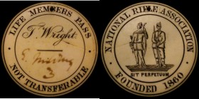 National Rifle Association Life Member's Pass (c.1900) 44mm diameter in ivory, holed at the top, Obverse: Two figures - an archer and a rifleman stand...