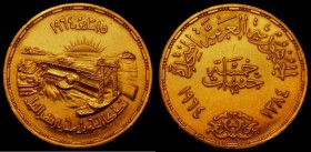Egypt Five Pounds Gold 1964 (AH1384) Reverse: Nile River basin scene KM#408 EF with some hairlines and a small thin scratch on the obverse. Our archiv...