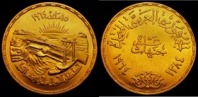Egypt Ten Pounds Gold 1964 (AH1384) Reverse: Nile River basin scene KM#409 GEF and lustrous the intricacy of the reverse design can be fully appreciat...