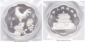 People's Republic silver Proof Scalloped "Year of the Rooster" 10 Yuan 1993, KM511. Mintage: 6,800. Sold with original case of issue and COA #4955. 

...