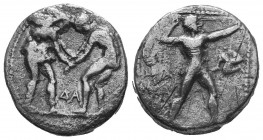 Aspendos, Pamphylia. AR Stater c. 380-325 BC.
Obv. Two wrestlers; between them, AΦ.
Rev. EΣTFEΔIIY, slinger to right, triskeles in right field.
SNG vo...