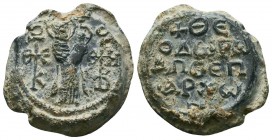Byzantine lead seal of Theodore honorary eparch (7th/8th cent.)
Obv.: Mother of God standing, holding Jesus Christ as child on her left hand, crucifor...