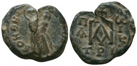 Byzantine lead seal of Paul (?) patrikios (7th/8th cent.)
Obv.: Mother of God standing, holding Jesus Christ as child on her left hand, circular inscr...