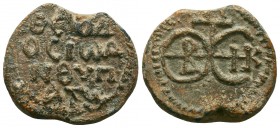 Byzantine lead seal of Theodosios anthypatos
(8th cent.)
Obv.: Block-monogram, resolved as ΘΕΟΤΟΚΕ ΒΟΗΘΕΙ (Mother of God, help), wreath border.
Rev.: ...