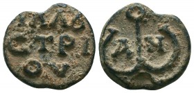 Byzantine lead seal of John illoustrios
(7th cent.)
Obv.: Block-monogram resolved as ΙΩΑΝΝΟΥ (of John).
 
Rev: Inscription in 3 lines, ΙΛΛΟV/CΤΡΙ/ΟV (...