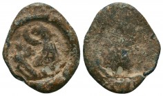 Roman imperial conical lead seal
(3rd/4th cent.)

Condition: Very Fine

Weight: 4.00 gr
Diameter: 22 mm