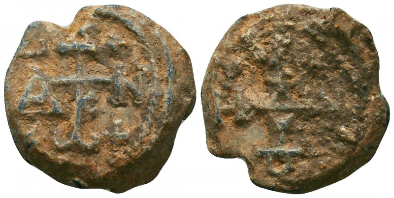 Byzantine lead seal of Constantine officer
(550-650)
Obv.: Invocative cruciform ...