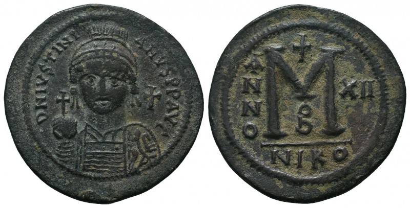 Justinian I. 527-565. Æ Follis.

Condition: Very Fine

Weight: 21.60 gr
Diameter...