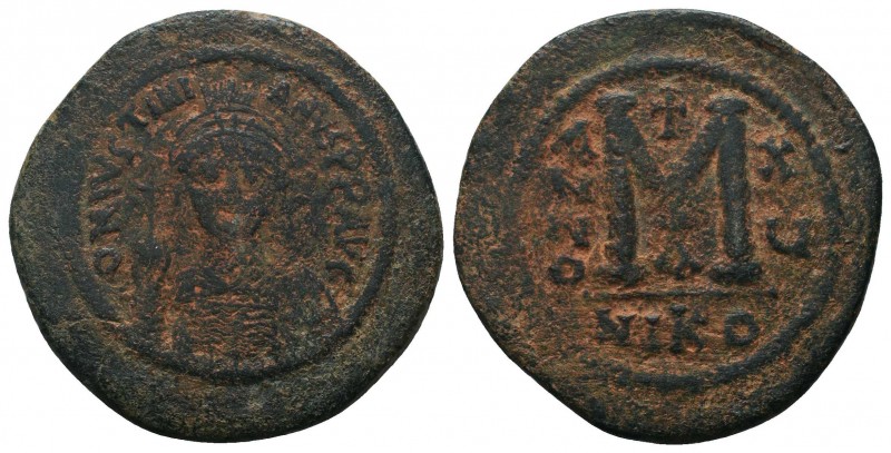 Justinian I. 527-565. Æ Follis.

Condition: Very Fine

Weight: 19.80 gr
Diameter...