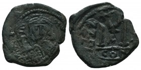 Maurice Tiberius. 582-602. Æ 

Condition: Very Fine

Weight: 5.60 gr
Diameter: 22 mm