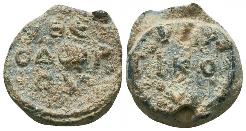 Byzantine lead seal of Theodore consularis (6th/7th cent.)
Obv.: +ΘΕ/ΟΔΩΡ/ΟΥ (O...