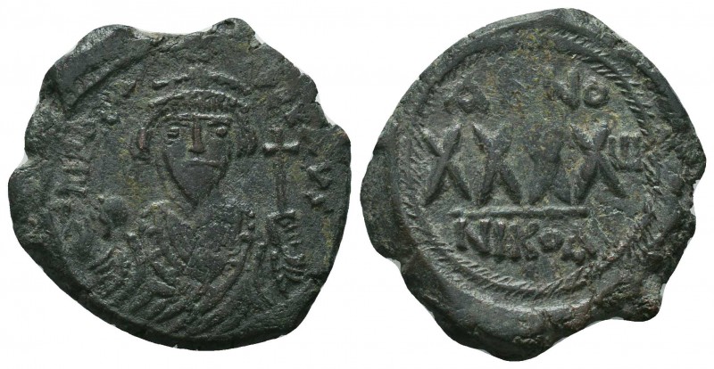 Phocas (602-610 AD). AE Follis

Condition: Very Fine

Weight: 12.30 gr
Diam...