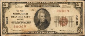 Traverse City, Michigan. $20 1929 Ty. 1. Fr. 1802-1. The First NB. Charter #3325. Very Fine.

A low serial number of "E000027A" is found on this Gra...