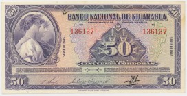 Nicaragua, 50 cordobas 1945
Technically a beautifull note. Some discolouration at right margin and some ink on the back.&nbsp;
Paper is firm, crisp ...