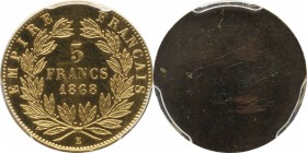 Gilt-copper essai uniface reverse 5 francs 1868 E, plain edge.
Rv. Denomination within wreath. Maz. 1626a.

Uniface de revers de la 5 francs en bro...