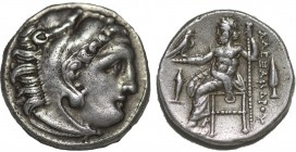 KINGS OF MACEDON. Alexander III 'the Great' (336-323 BC). Drachm. Kolophon.
Obv: Head of Herakles right, wearing lion skin.
Rev: AΛΕΞΑΝΔΡΟΥ.
Zeus s...