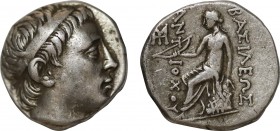 SELEUKID KINGDOM. Antiochos II Theos (261–246 BC). Drachm. Uncertain mint.
Obv: Diademed head right.
Rev: BAΣIΛEΩΣ ANTIOXOY.
Apollo seated left on omp...