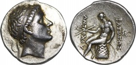 SELEUKID KINGDOM. Antiochos II (261-246 BC). Obv: Diademed head of Antiochos. Rev: BAΣIΛEΩΣ ANTIOXOY, Apollo seated on omphalos l.holding bow and arro...