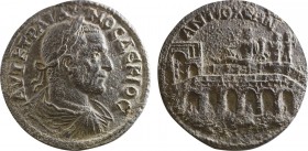 CARIA, Antiochia ad Maeandrum. Trajan Decius. (AD 249-251). Ae. Obv: Laureate, draped, and cuirassed bust right. Rev: Bridge of six arches with gatewa...