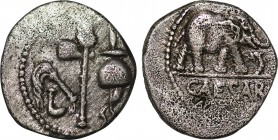 JULIUS CAESAR. Denarius (49 BC). Military mint traveling with Caesar.
Obv: CAESAR.
Elephant advancing right, trampling upon horned serpent.
Rev: Emble...
