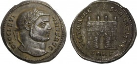 DIOCLETIAN (284-305). Argenteus. Nicomedia.
Obv: DIOCLETIANVS AVG.
Laureate head right.
Rev: VICTORIAE SARMATICAE / SMNΓ.
Camp gate, with four towers ...