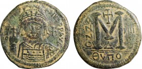 JUSTINIAN I (527-565). Follis. Theopoulis (Antioch). Dated RY 13 (539/40).
Obv: D N IVSTINIANVS P P AVG.
Helmeted and cuirassed bust facing, holding g...