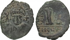 Justinian I (527-565). Æ 10 Nummi. Theoupolis (Antioch), year 1 (556/7). Obv: Crowned and cuirassed facing bust, holding globus cruciger and shield; c...