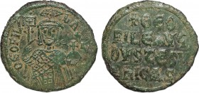 THEOPHILUS, (829-842). Follis. Ae. Obv: Θ'OFIL' - bASIL' Three-quarter length figure facing, wearing loros and crown surmounted by tufa ornamented wit...