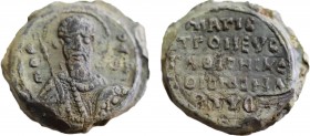 Lead seal. Theodoros, uncertain (Circa 11th century).
Obv: Half-length bust of St. Theodore facing, holding shield and spear.
Rev: Legend in five line...