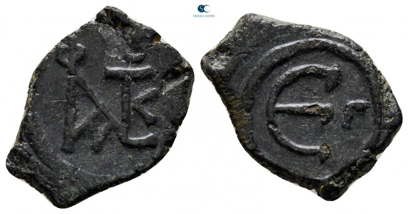 Justin II AD 565-578. Constantinople
Pentanummium Æ

18 mm., 2,34 g.

very ...